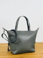 Bolso de piel bandolera con asas de mano