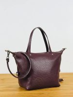 Bolso de piel bandolera con asas de mano