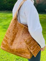 Bolso piel con efecto trenzado