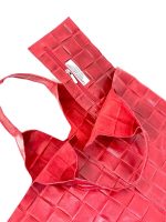 Bolso saco piel con efecto trenzado