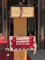 Bandolera de piel con concha