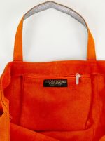 Bolso de piel con serraje y brillo estampado