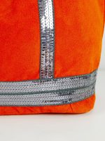 Bolso de piel con serraje y brillo estampado