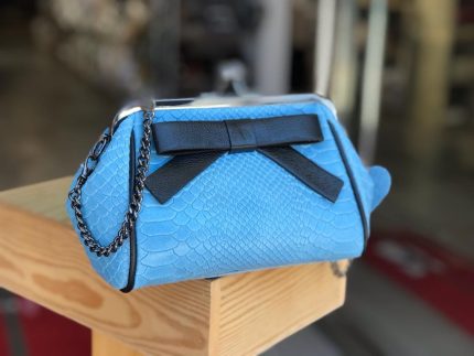 Bandolera diseño coco con lazo en piel