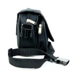 Bandolerita de nailon con solapa