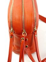 Bandolera de piel con tres bolsillos