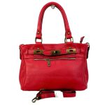 Bolso piel con bolsillo frontal y cierre giro decorativo