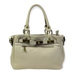 Bolso piel con bolsillo frontal y cierre giro decorativo